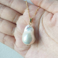 White lustrous baroque pearl pendant
