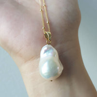 White lustrous baroque pearl pendant
